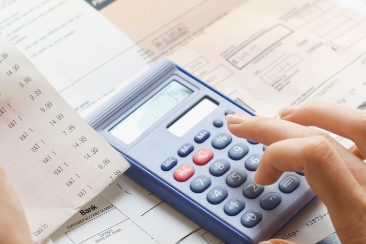 A calculator and some financial documents